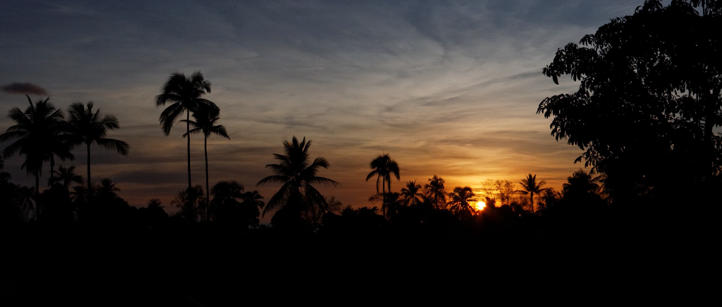Sunset at Mai Khao Beach in Phuket, Thailand